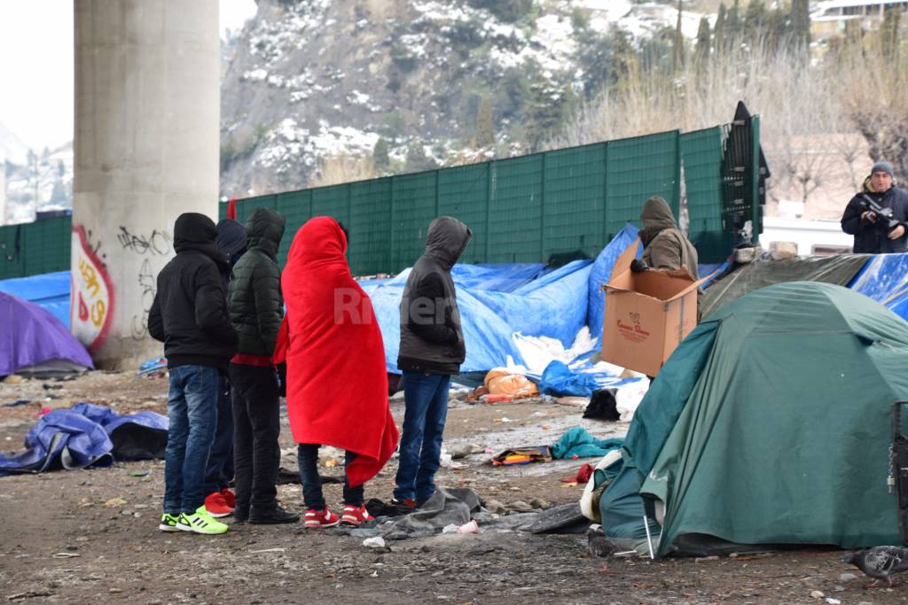 Migranti sotto la neve